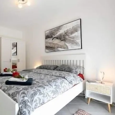 Rent this 2 bed condo on Bioggio in Distretto di Lugano, Switzerland