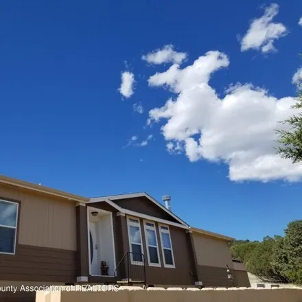 Buy this studio apartment on 150 Goodnight Loving Trail in Lincoln County, NM 88255