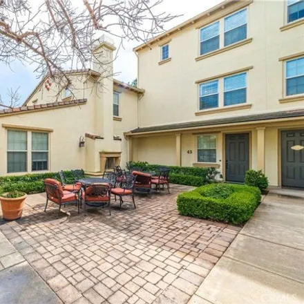 Rent this 3 bed townhouse on 41 Spanish Lace in Irvine, CA 92620