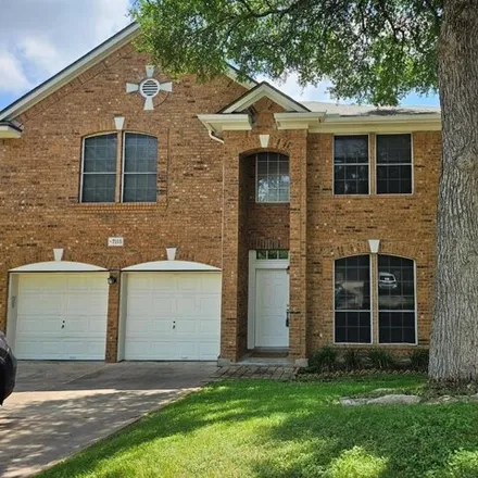 Rent this 4 bed house on 7105 Wandering Oak Road in Austin, TX 78749