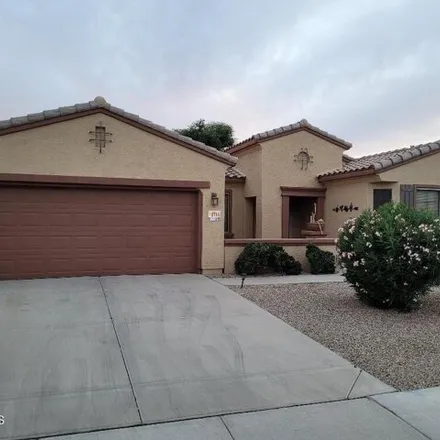 Rent this 2 bed house on 18766 North Summerbreeze Way in Surprise, AZ 85374