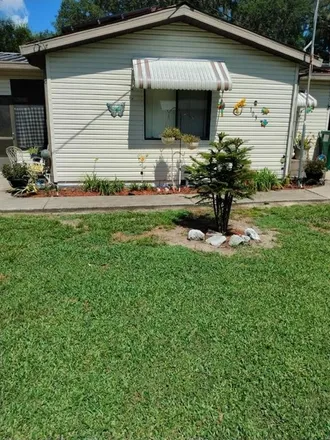 Buy this 2 bed house on 101 2nd Street in Lady Lake, FL 32159