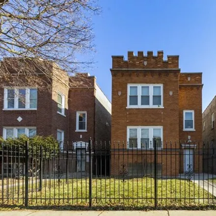 Buy this 6 bed house on 1707 North Marmora Avenue in Chicago, IL 60639