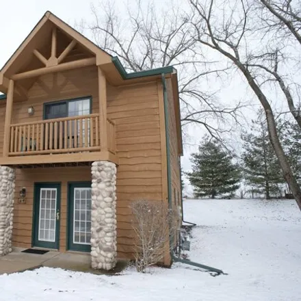 Buy this 2 bed townhouse on Grizzly Jacks Grand Bear Resort in East 8th Road, North Utica