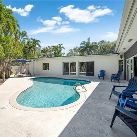 Image 1 - 1031 Redbird Avenue, Miami Springs, FL 33166, USA - House for rent