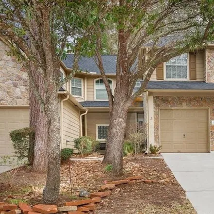 Rent this 3 bed townhouse on 48 North Valley Oaks Circle in Alden Bridge, The Woodlands