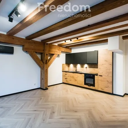 Rent this 2 bed apartment on Magazyn prowiantowy in Kardynała Stefana Wyszyńskiego, 14-200 Iława