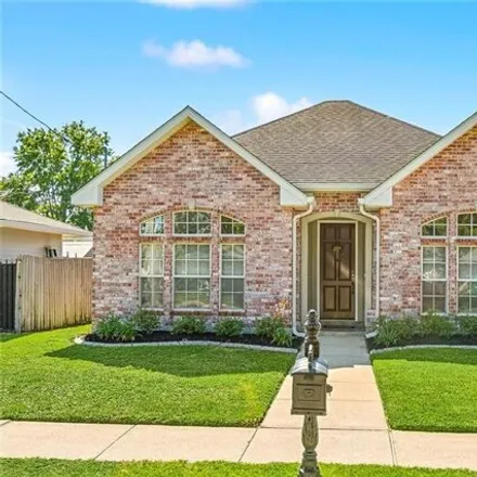 Buy this 4 bed house on 1900 North Woodlawn Avenue in Metairie, LA 70001