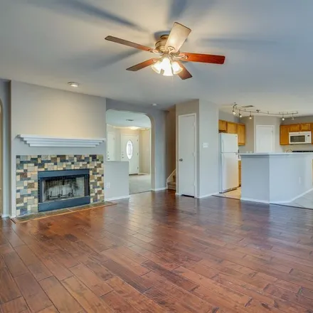 Rent this 4 bed house on 2032 Peregrine Court in Lewisville, TX 75077