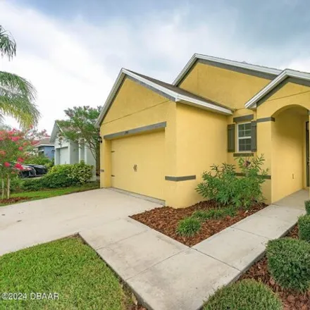 Buy this 3 bed house on 2908 Taton Trace in Coastal Woods, New Smyrna Beach