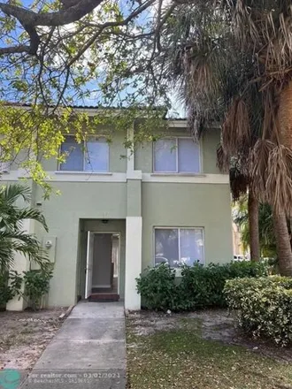 Rent this 3 bed townhouse on unnamed road in Hollywood, FL 33023
