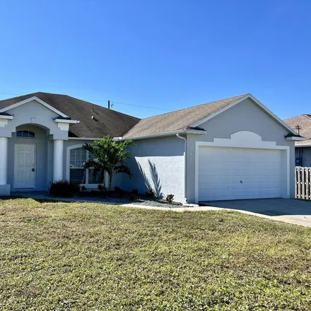 Buy this 4 bed house on 532 Southwest Kabot Avenue in Port Saint Lucie, FL 34953