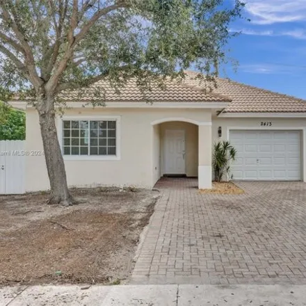 Buy this 3 bed house on 2413 NW 15th Ct in Fort Lauderdale, Florida