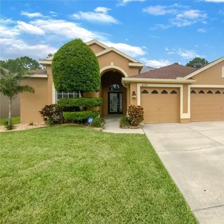 Buy this 4 bed house on 2707 Ravendale Ln in Holiday, Florida