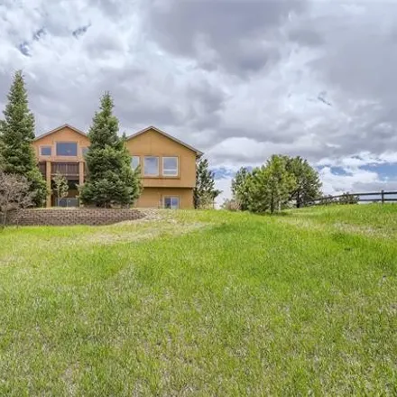 Buy this 6 bed house on 17902 New London Road in El Paso County, CO 80132