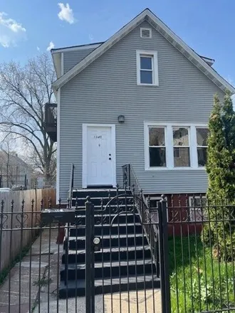 Buy this 5 bed house on 1345 West 49th Place in Chicago, IL 60609