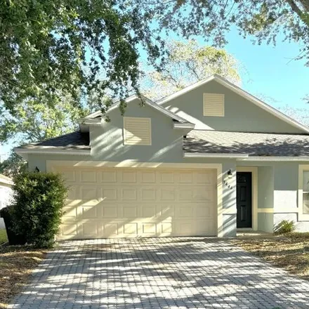 Rent this 4 bed house on 5446 Andrea Street in Titusville, FL 32780