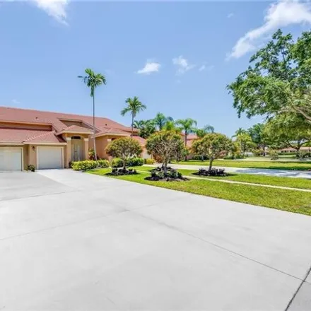 Rent this 2 bed condo on 6710 Huntington Lakes Cir Apt 202 in Naples, Florida