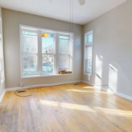 Rent this 5 bed apartment on #1f,1457 North Washtenaw Avenue in East Humboldt Park, Chicago