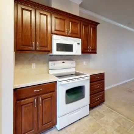 Rent this 3 bed apartment on 219 Karten Lane in Edelweiss Gartens, College Station