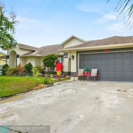 Buy this 3 bed house on 1068 Sw Barbarosa Ave in Port Saint Lucie, Florida