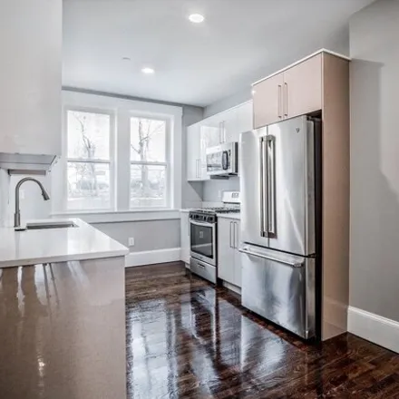 Rent this 4 bed apartment on 59 Strathmore Road in Boston, MA 02135