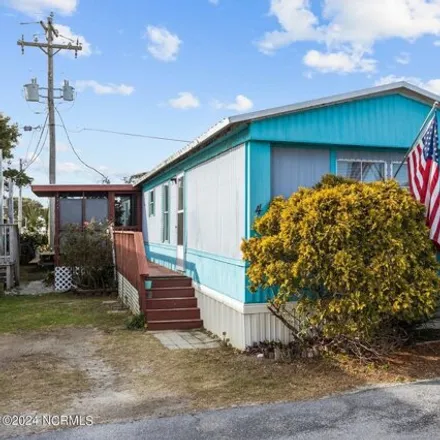 Buy this studio apartment on Sea Gull Lane in Indian Beach, Carteret County