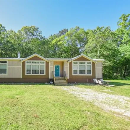 Rent this 4 bed house on 27240 Lazy South Street in Montgomery County, TX 77372