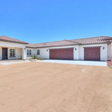Buy this 5 bed house on South 196th Drive in Maricopa County, AZ