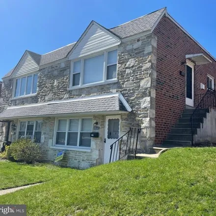 Rent this 3 bed house on 1914 Goodnaw Street in Philadelphia, PA 19115