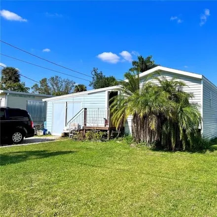 Buy this studio apartment on 1546 Woodlawn Avenue in Charlotte County, FL 33950