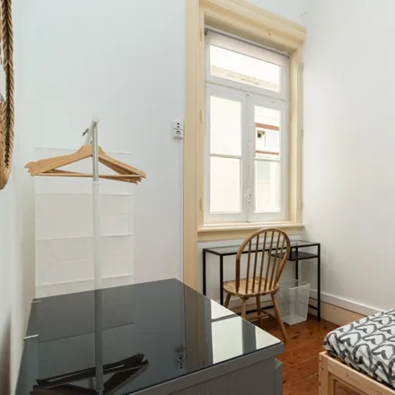 Rent this 11 bed room on Capital in Avenida Elias Garcia 87, 1050-097 Lisbon