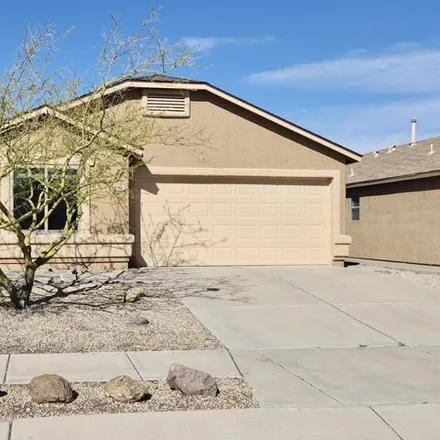 Rent this 3 bed house on 7961 South Baja Stone Avenue in Tucson, AZ 85756