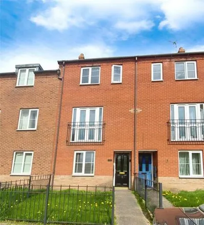 Rent this 4 bed townhouse on Whitebeam Way in Nuneaton, CV10 0LJ