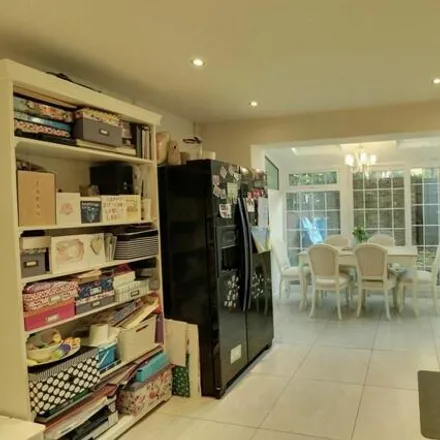 Rent this 4 bed townhouse on 38 Mutrix Road in London, NW6 4QG