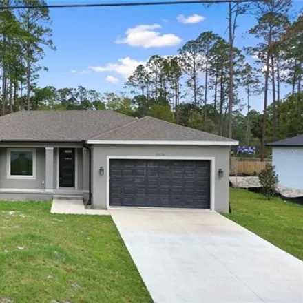 Buy this 3 bed house on 2379 8th Ave in Deland, Florida