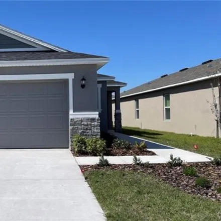 Rent this 3 bed house on 2099 Shoreland Drive in Auburndale, FL 33823