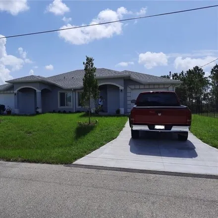 Buy this 6 bed house on 2801 Gilbert Avenue in Lehigh Acres, FL 33973