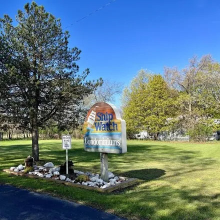 Buy this 2 bed condo on 317 5th Ave Apt 1 in Manistee, Michigan