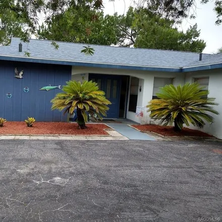 Buy this 3 bed house on 11906 West Coquina Court in Citrus County, FL 34429