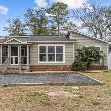 Buy this 3 bed house on 3959 East Yacht Drive in Oak Island, Brunswick County