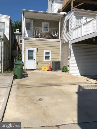 Rent this 4 bed townhouse on 1403 South Charles Street in Baltimore, MD 21230