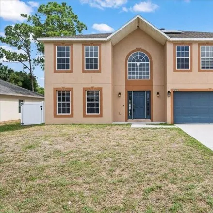 Buy this 6 bed house on 473 Crystalmist Rd NW in Palm Bay, Florida