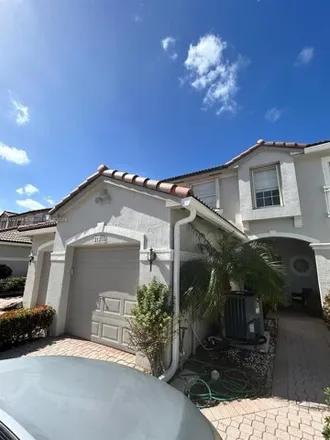 Rent this 3 bed townhouse on 21191 Via Eden in Palm Beach County, FL 33433