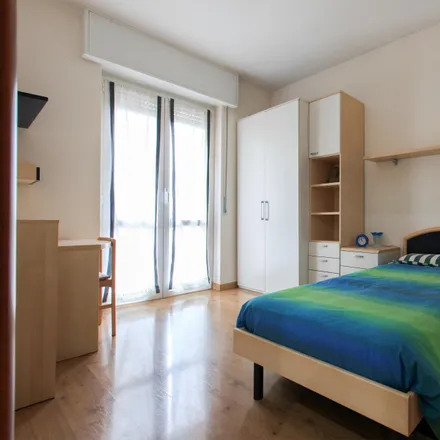 Rent this 3 bed room on Via Vittorio Scialoia in 20161 Milan MI, Italy