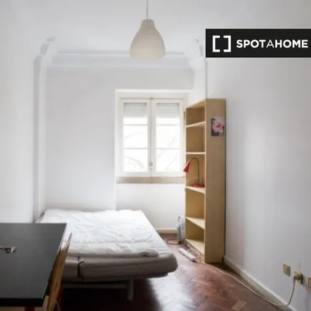 Rent this 7 bed room on Rua Passos Manuel 64 in 1150-258 Lisbon, Portugal