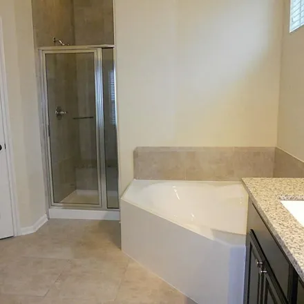 Rent this 3 bed apartment on 12277 Stellano Lane in Fort Bend County, TX 77406