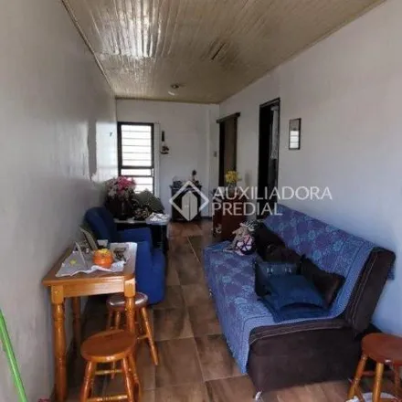 Buy this 2 bed house on Rua Agenor Mendes Ouriques in Guarujá, Porto Alegre - RS