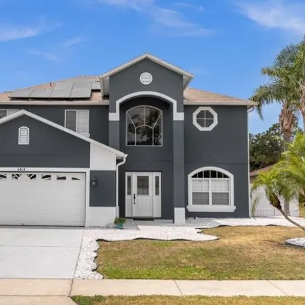 Buy this 4 bed house on 4418 Canopy Court in Poinciana, FL 34758