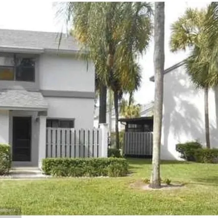 Rent this 2 bed townhouse on 3080 Portofino Point in Coconut Creek, FL 33066
